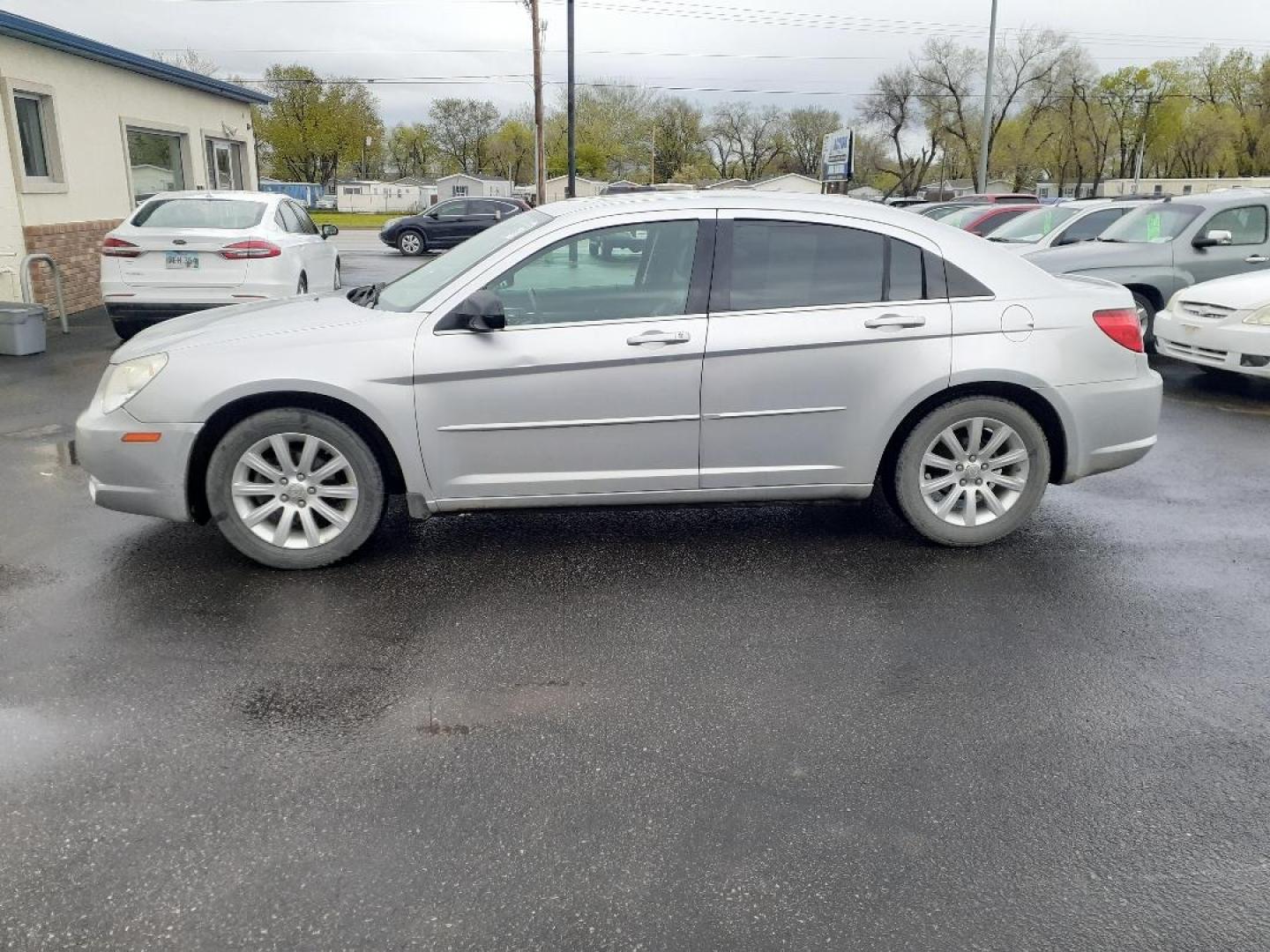 2010 Chrysler Sebring Sedan Limited (1C3CC5FD2AN) with an 2.7L V6 DOHC 24V FFV engine, 4-Speed Automatic transmission, located at 2015 Cambell Street, Rapid City, SD, 57701, (605) 342-8326, 44.066433, -103.191772 - Photo#0