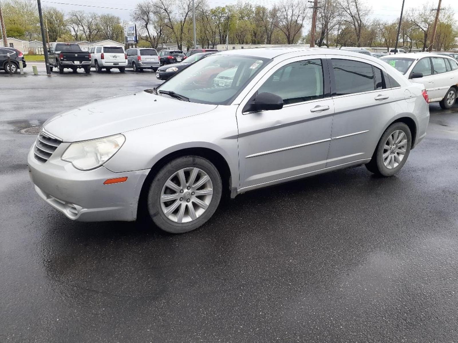 2010 Chrysler Sebring Sedan Limited (1C3CC5FD2AN) with an 2.7L V6 DOHC 24V FFV engine, 4-Speed Automatic transmission, located at 2015 Cambell Street, Rapid City, SD, 57701, (605) 342-8326, 44.066433, -103.191772 - CARFAX AVAILABLE - Photo #1