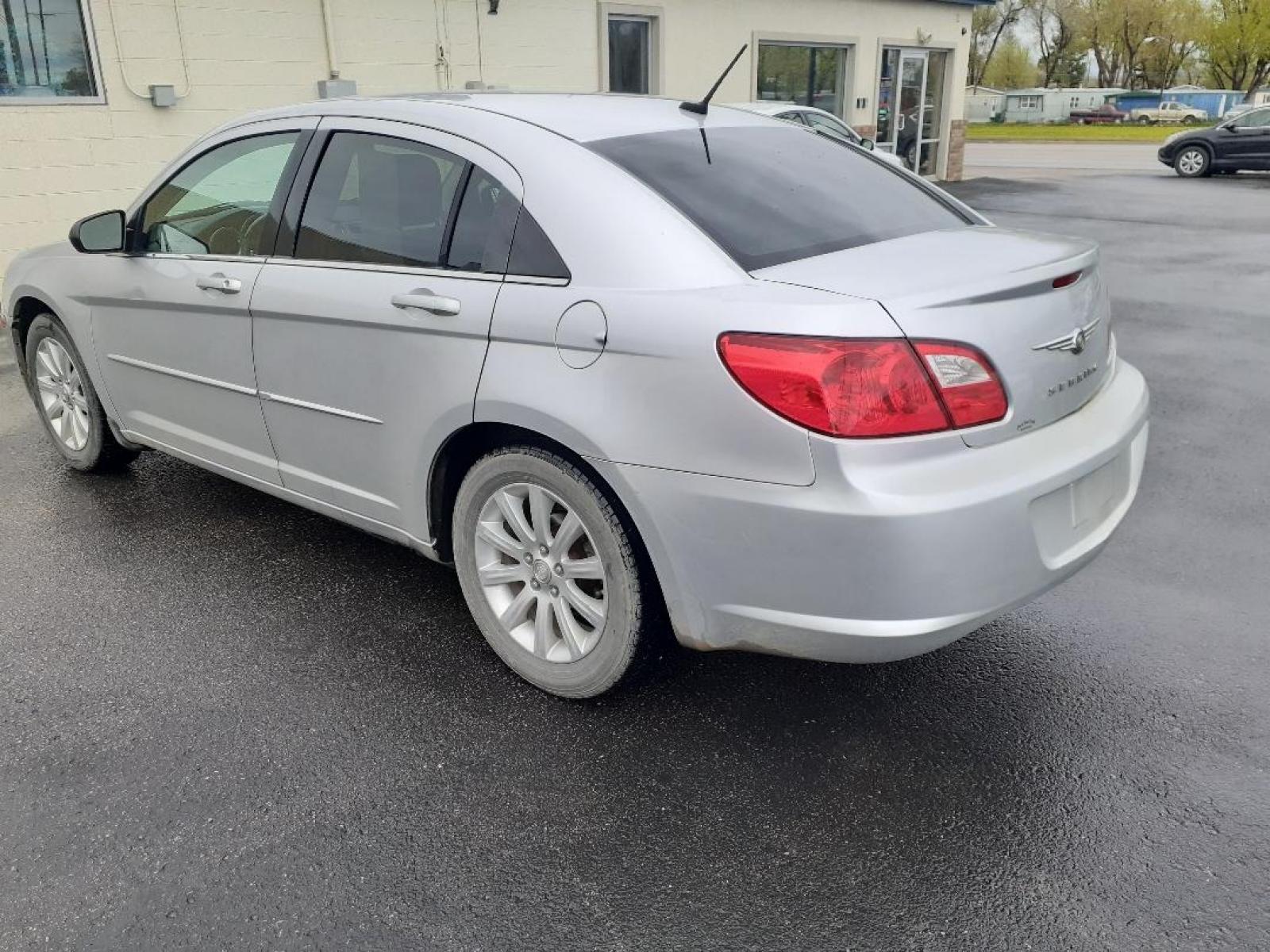 2010 Chrysler Sebring Sedan Limited (1C3CC5FD2AN) with an 2.7L V6 DOHC 24V FFV engine, 4-Speed Automatic transmission, located at 2015 Cambell Street, Rapid City, SD, 57701, (605) 342-8326, 44.066433, -103.191772 - CARFAX AVAILABLE - Photo #2