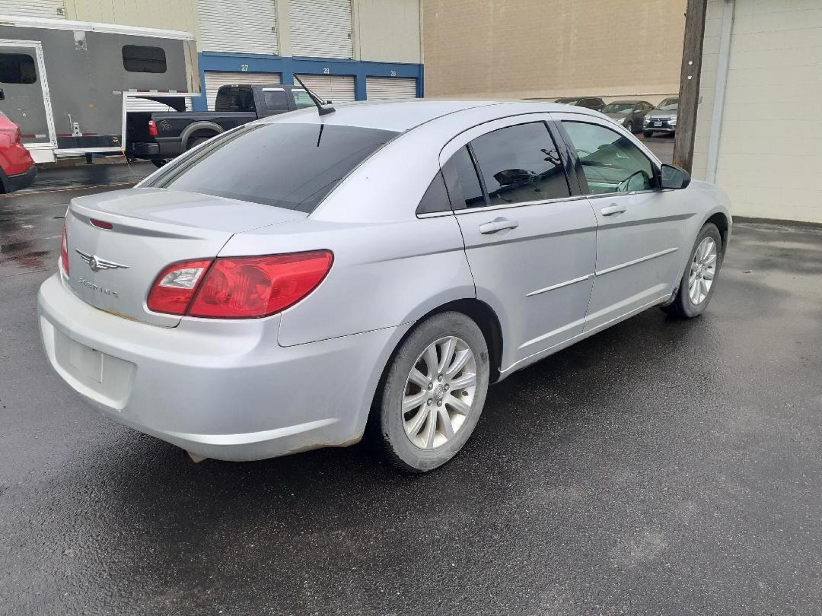 2010 Chrysler Sebring Sedan Limited (1C3CC5FD2AN) with an 2.7L V6 DOHC 24V FFV engine, 4-Speed Automatic transmission, located at 2015 Cambell Street, Rapid City, SD, 57701, (605) 342-8326, 44.066433, -103.191772 - CARFAX AVAILABLE - Photo #3