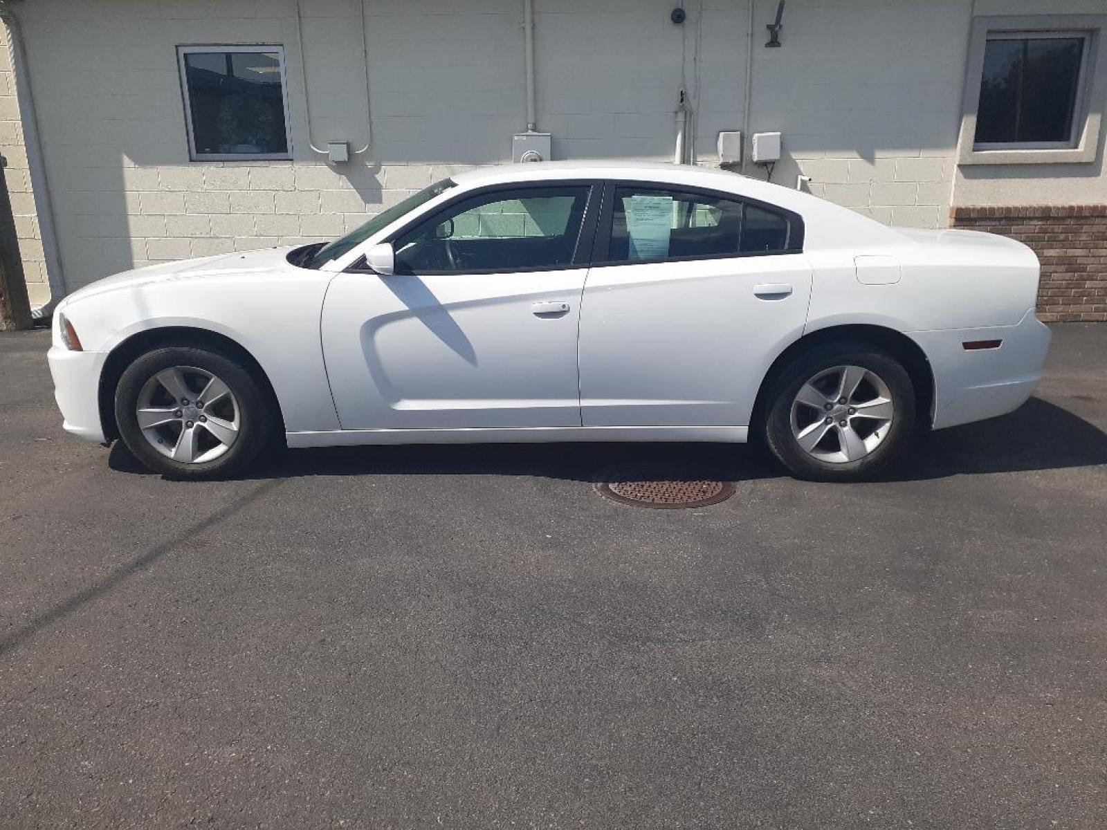2014 Dodge Charger SE (2C3CDXBG2EH) with an 3.6L V6 DOHC 24V engine, 5-Speed Automatic transmission, located at 2015 Cambell Street, Rapid City, SD, 57701, (605) 342-8326, 44.066433, -103.191772 - CARFAX AVAILABLE - Photo #0