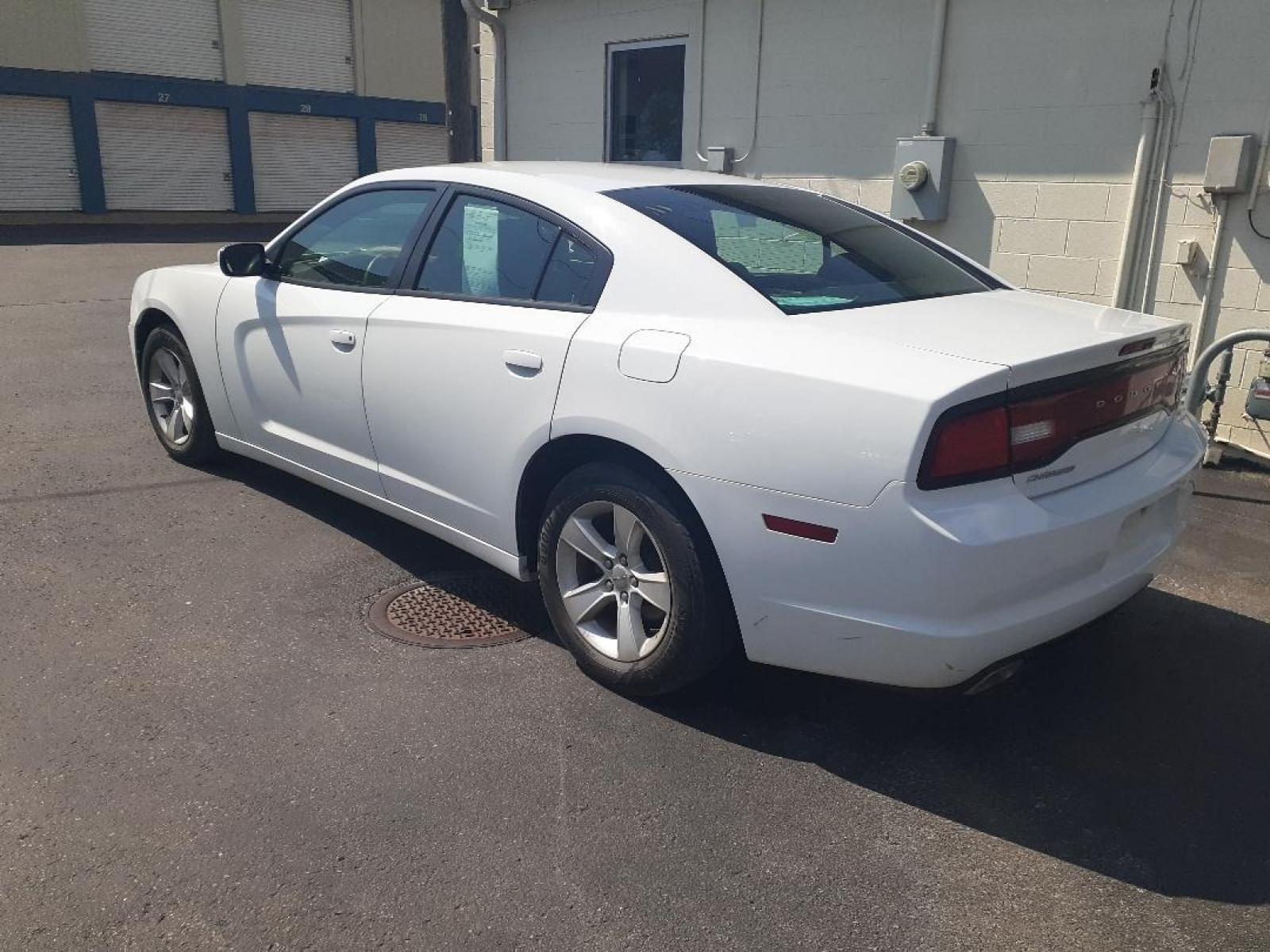 2014 Dodge Charger SE (2C3CDXBG2EH) with an 3.6L V6 DOHC 24V engine, 5-Speed Automatic transmission, located at 2015 Cambell Street, Rapid City, SD, 57701, (605) 342-8326, 44.066433, -103.191772 - CARFAX AVAILABLE - Photo #3