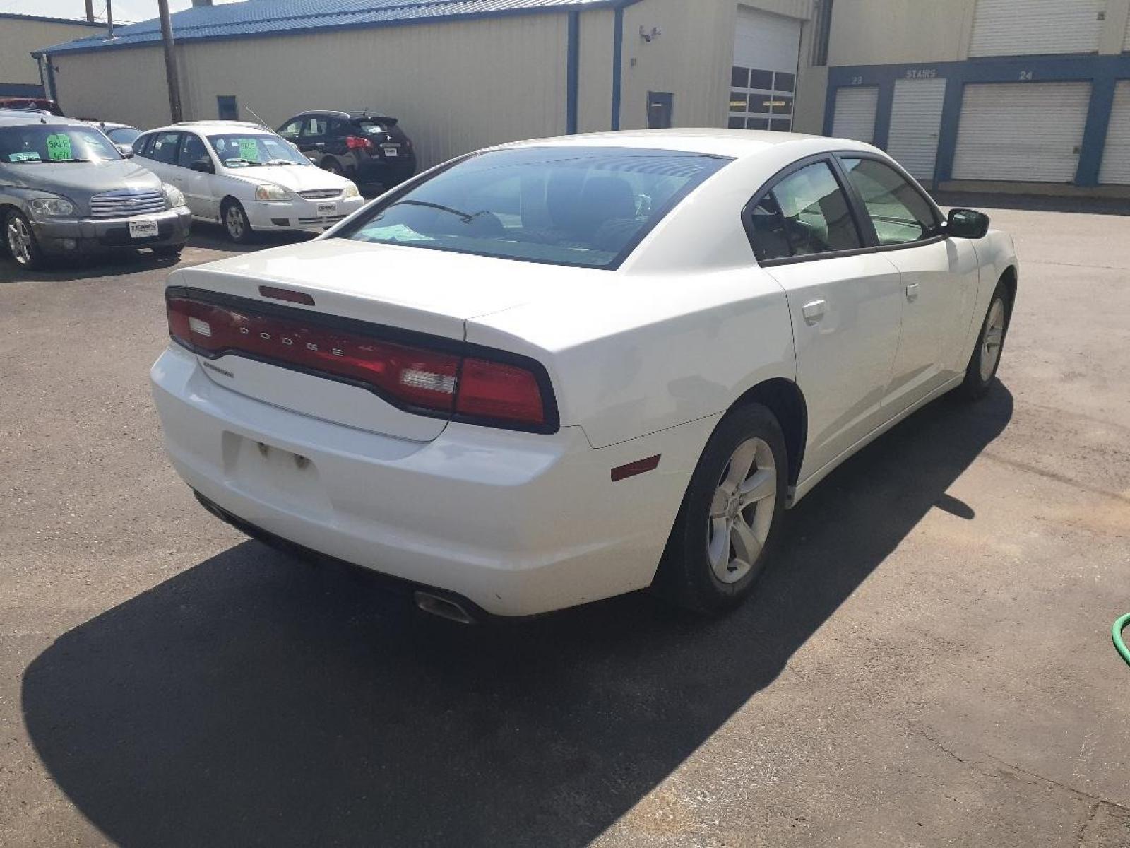 2014 Dodge Charger SE (2C3CDXBG2EH) with an 3.6L V6 DOHC 24V engine, 5-Speed Automatic transmission, located at 2015 Cambell Street, Rapid City, SD, 57701, (605) 342-8326, 44.066433, -103.191772 - CARFAX AVAILABLE - Photo #4