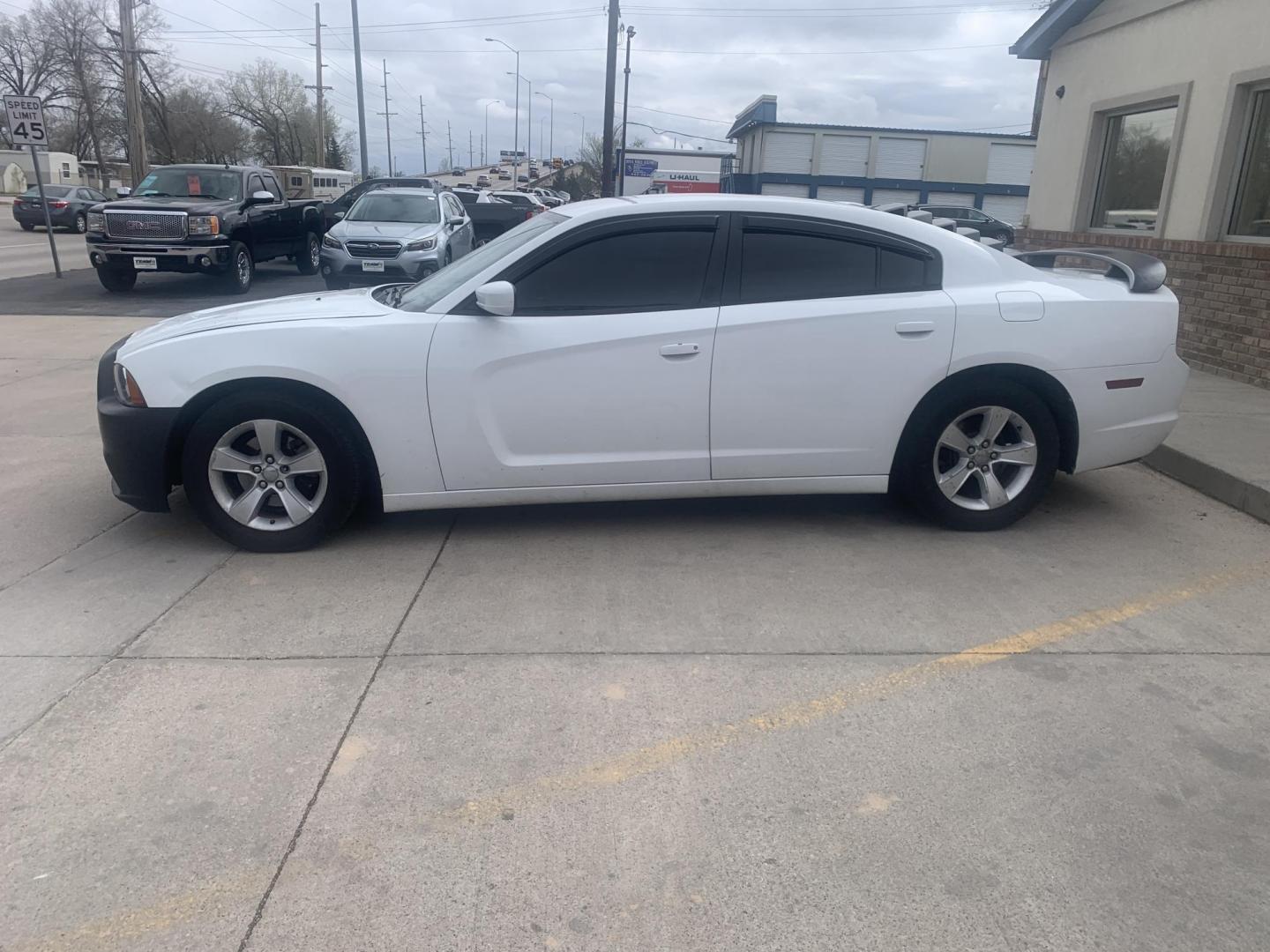 2014 Dodge Charger SE (2C3CDXBG2EH) with an 3.6L V6 DOHC 24V engine, 5-Speed Automatic transmission, located at 2015 Cambell Street, Rapid City, SD, 57701, (605) 342-8326, 44.066433, -103.191772 - CARFAX AVAILABLE - Photo#3