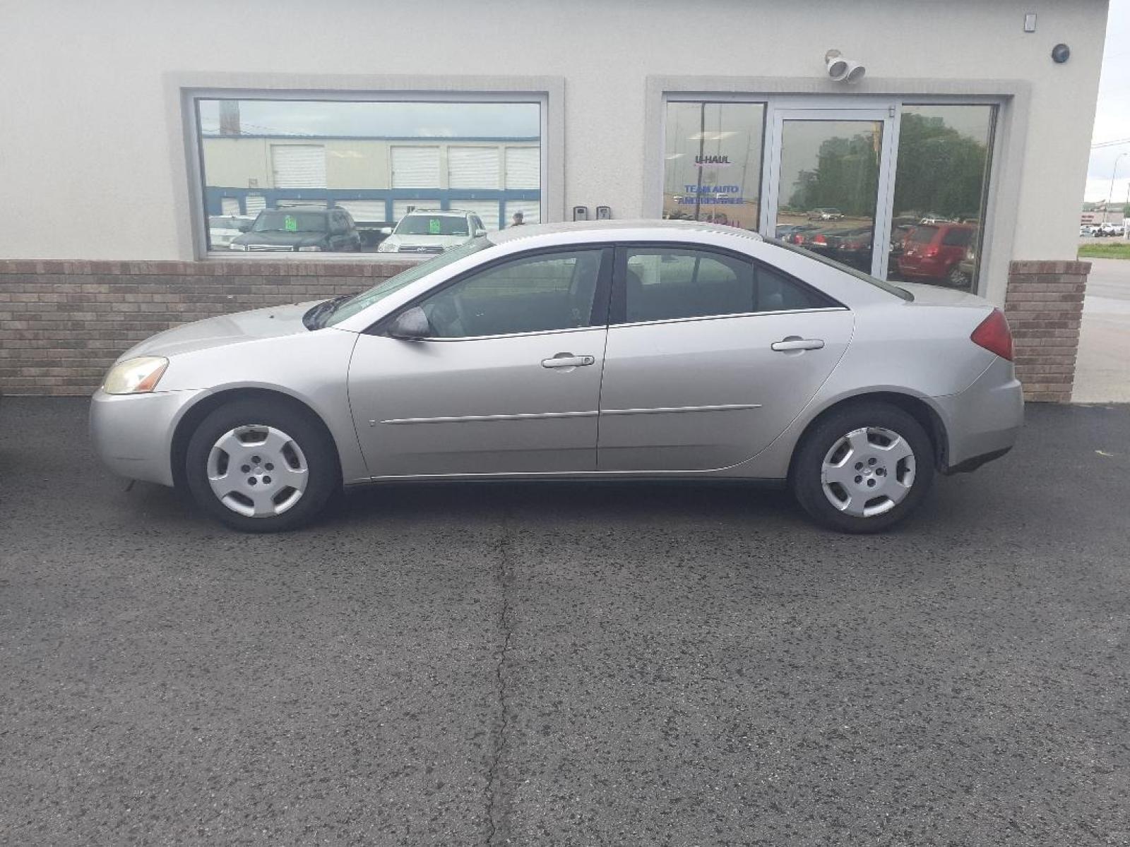 2007 Pontiac G6 1SV Sedan (1G2ZF58B974) with an 2.4L L4 DOHC 16V engine, 4-Speed Automatic Overdrive transmission, located at 2015 Cambell Street, Rapid City, SD, 57701, (605) 342-8326, 44.066433, -103.191772 - CARFAX AVAILABLE - Photo #0