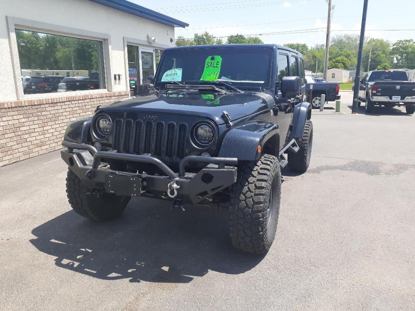 2015 Jeep Wrangler Unlimited Sahara 4WD (1C4BJWEGXFL) with an 3.6L V6 DOHC 24V FFV engine, located at 2015 Cambell Street, Rapid City, SD, 57701, (605) 342-8326, 44.066433, -103.191772 - CARFAX AVAILABLE - Photo#2