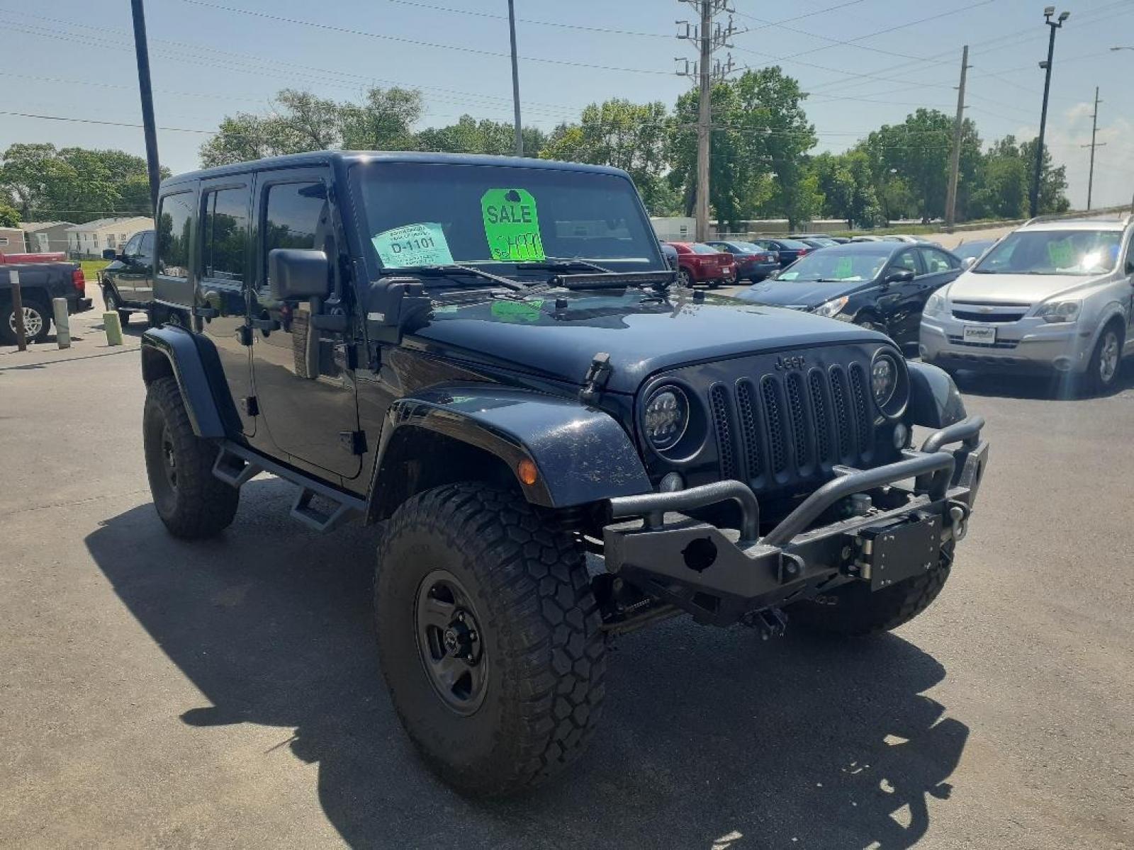 2015 Jeep Wrangler Unlimited Sahara 4WD (1C4BJWEGXFL) with an 3.6L V6 DOHC 24V FFV engine, located at 2015 Cambell Street, Rapid City, SD, 57701, (605) 342-8326, 44.066433, -103.191772 - CARFAX AVAILABLE - Photo #3