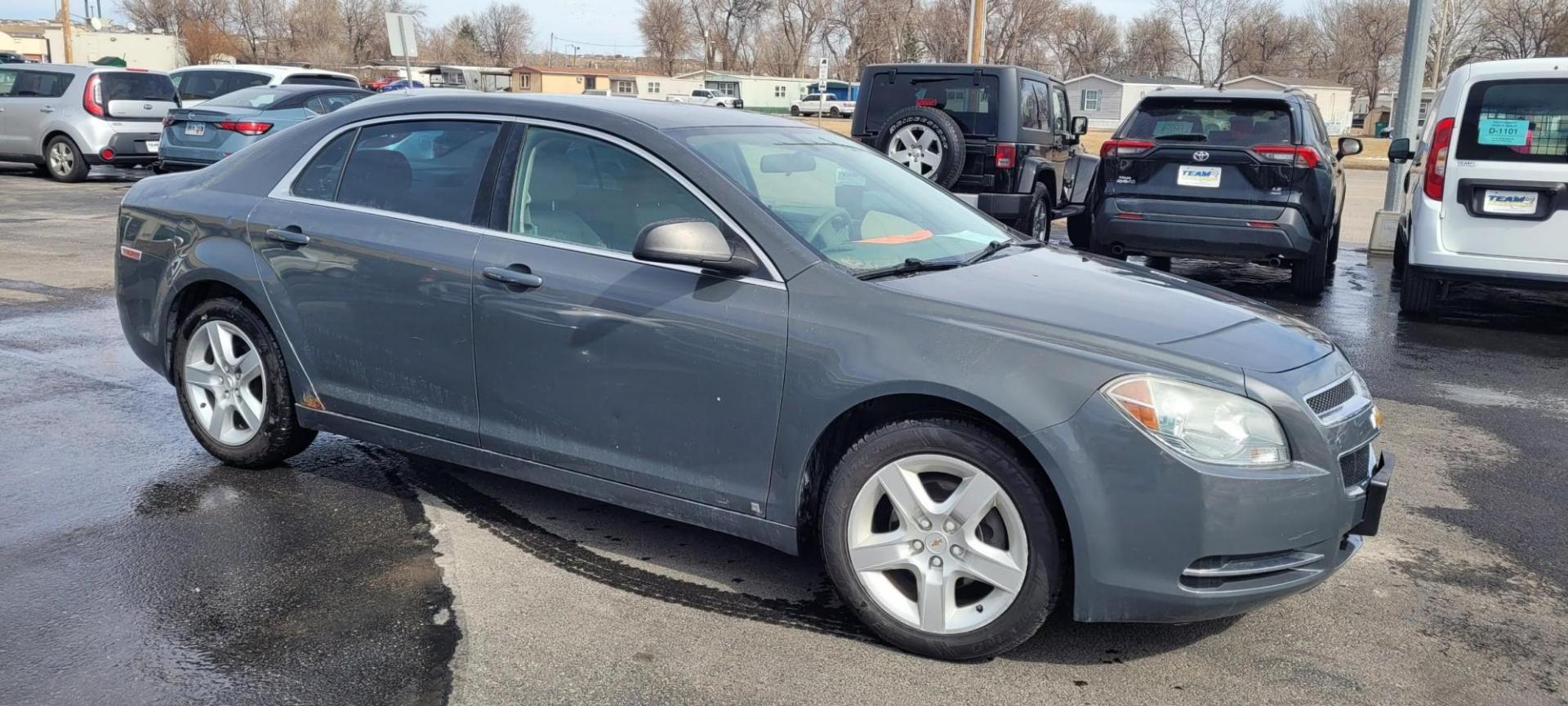 2009 Gray Chevrolet Malibu LS (1G1ZG57B69F) with an 2.4L L4 DOHC 16V engine, 4-Speed Automatic Overdrive transmission, located at 2015 Cambell Street, Rapid City, SD, 57701, (605) 342-8326, 44.066433, -103.191772 - CARFAX AVAILABLE FRESH TRADE CASH ONLY - Photo#0