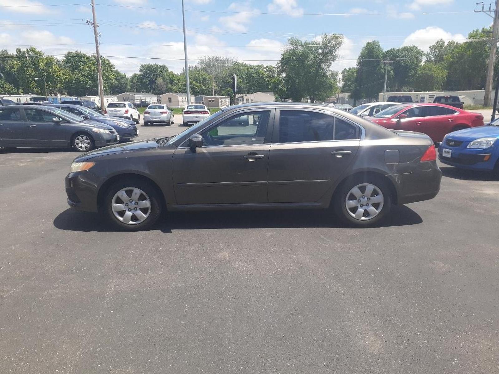 2009 Kia Optima EX (KNAGE228295) with an 2.4L L4 DOHC 16V engine, 4-Speed Automatic transmission, located at 2015 Cambell Street, Rapid City, SD, 57701, (605) 342-8326, 44.066433, -103.191772 - CARFAX AVAILABLE - Photo #0