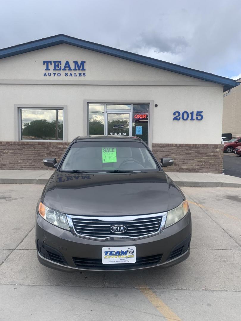 2009 Kia Optima EX (KNAGE228295) with an 2.4L L4 DOHC 16V engine, 4-Speed Automatic transmission, located at 2015 Cambell Street, Rapid City, SD, 57701, (605) 342-8326, 44.066433, -103.191772 - CARFAX AVAILABLE FRESH TRADE CASH ONLY - Photo#1