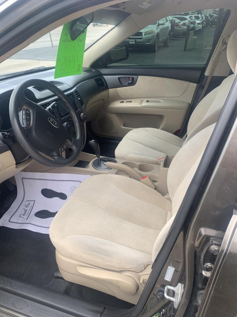2009 Kia Optima EX (KNAGE228295) with an 2.4L L4 DOHC 16V engine, 4-Speed Automatic transmission, located at 2015 Cambell Street, Rapid City, SD, 57701, (605) 342-8326, 44.066433, -103.191772 - CARFAX AVAILABLE FRESH TRADE CASH ONLY - Photo#3