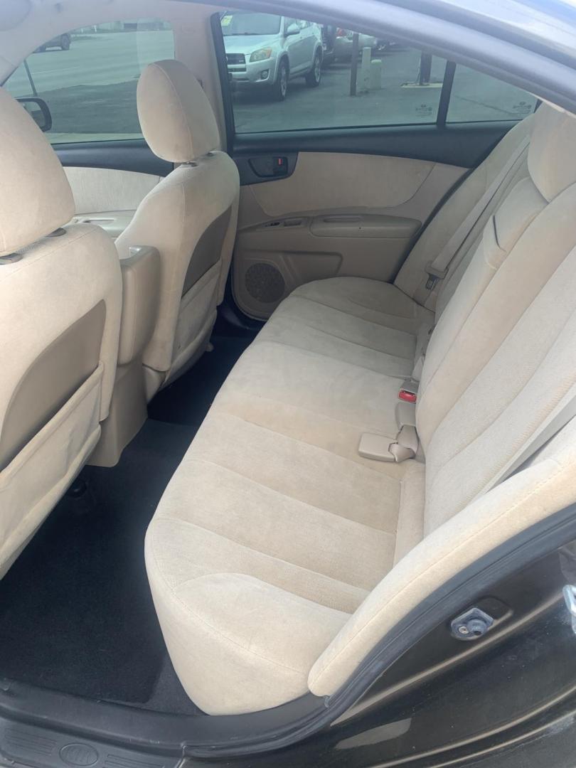 2009 Kia Optima EX (KNAGE228295) with an 2.4L L4 DOHC 16V engine, 4-Speed Automatic transmission, located at 2015 Cambell Street, Rapid City, SD, 57701, (605) 342-8326, 44.066433, -103.191772 - CARFAX AVAILABLE FRESH TRADE CASH ONLY - Photo#4