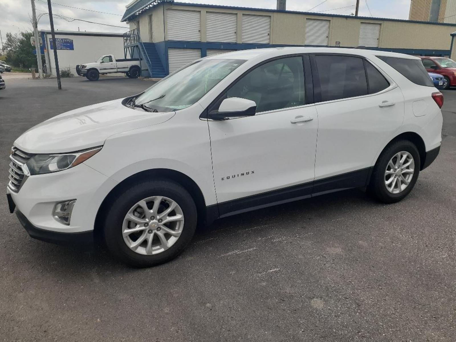 2018 Chevrolet Equinox LT AWD (3GNAXSEV0JS) with an 1.5L L4 DIR DOHC 16V TURBO engine, 6A transmission, located at 2015 Cambell Street, Rapid City, SD, 57701, (605) 342-8326, 44.066433, -103.191772 - CARFAX AVAILABLE - Photo #0