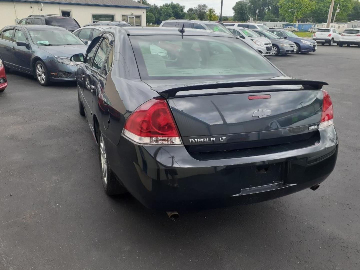 2013 Chevrolet Impala LT (2G1WB5E38D1) with an 3.6L V6 DOHC 16V FFV engine, 6-Speed Automatic transmission, located at 2015 Cambell Street, Rapid City, SD, 57701, (605) 342-8326, 44.066433, -103.191772 - CARFAX AVAILABLE - Photo#1