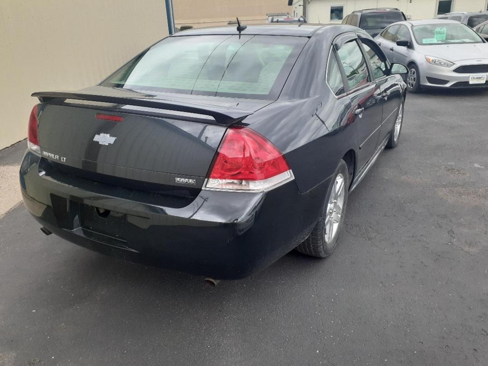 2013 Chevrolet Impala LT (2G1WB5E38D1) with an 3.6L V6 DOHC 16V FFV engine, 6-Speed Automatic transmission, located at 2015 Cambell Street, Rapid City, SD, 57701, (605) 342-8326, 44.066433, -103.191772 - CARFAX AVAILABLE - Photo #6