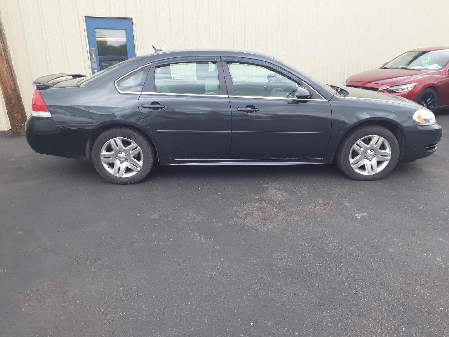 2013 Chevrolet Impala LT (2G1WB5E38D1) with an 3.6L V6 DOHC 16V FFV engine, 6-Speed Automatic transmission, located at 2015 Cambell Street, Rapid City, SD, 57701, (605) 342-8326, 44.066433, -103.191772 - CARFAX AVAILABLE - Photo#7