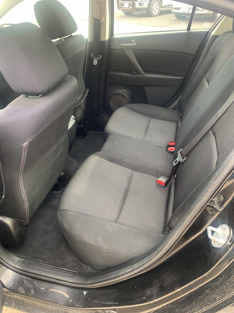 2012 black Mazda MAZDA3 i Sport 4-Door (JM1BL1UGXC1) with an 2.0L L4 DOHC 16V engine, located at 2015 Cambell Street, Rapid City, SD, 57701, (605) 342-8326, 44.066433, -103.191772 - CARFAX AVAILABLE fresh trade CASH ONLY BIG DENT ON PASSENGER REAR DOOR!!!- Photo#6
