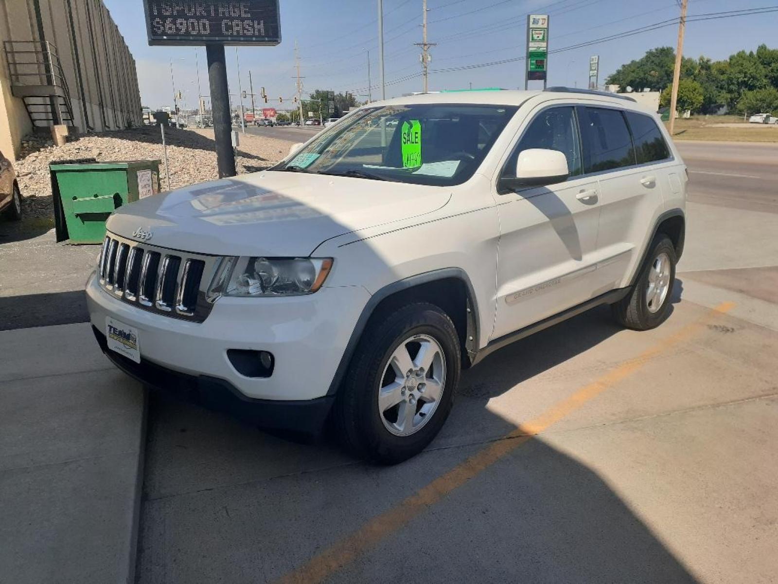 2012 Jeep Grand Cherokee Laredo 4WD (1C4RJFAG0CC) with an 3.6L V6 DOHC 24V engine, 5-Speed Automatic transmission, located at 2015 Cambell Street, Rapid City, SD, 57701, (605) 342-8326, 44.066433, -103.191772 - CARFAX AVAILABLE - Photo #1