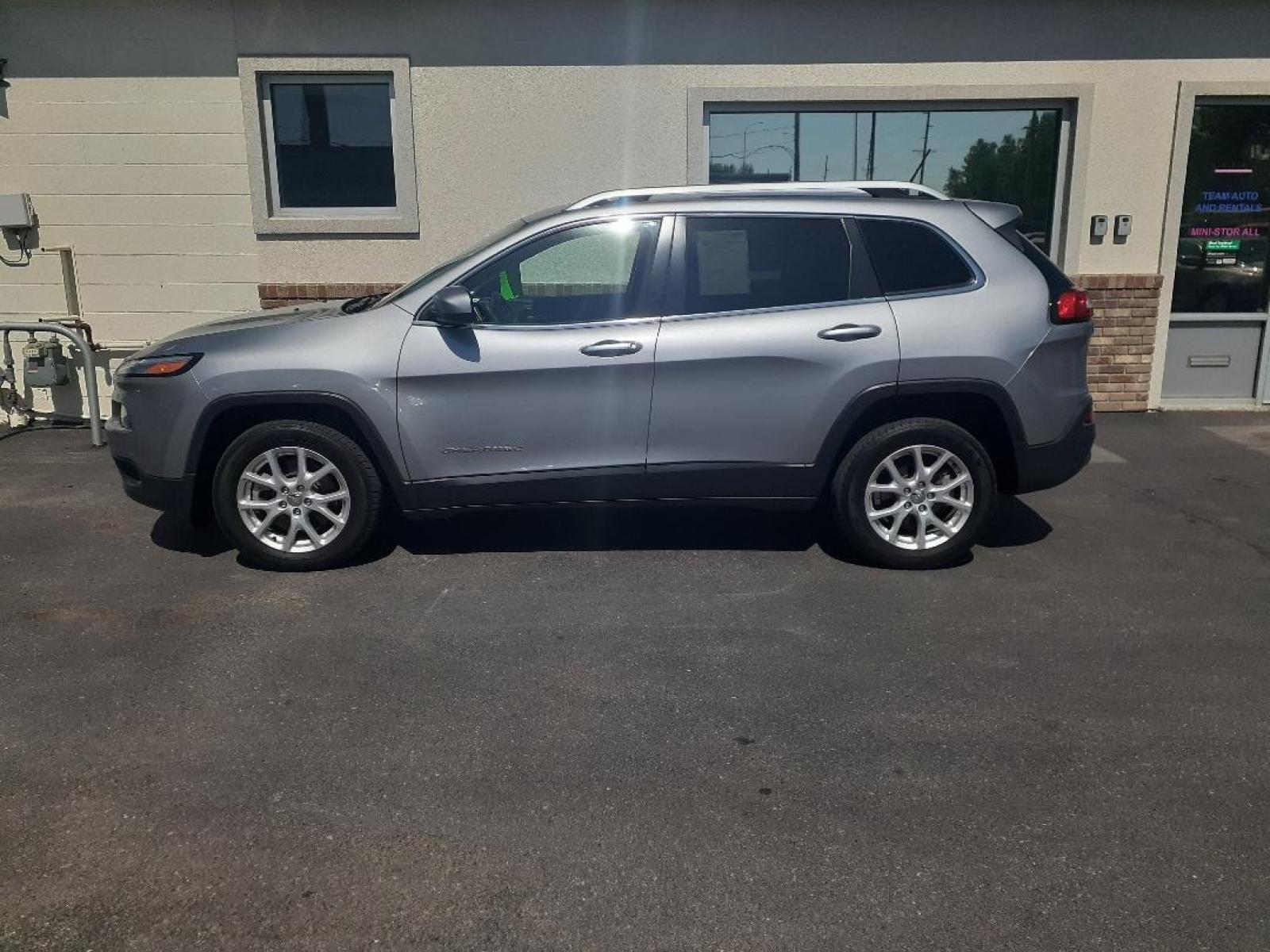 2014 Jeep Cherokee Latitude FWD (1C4PJLCB8EW) with an 2.4L L4 DOHC 16V engine, 9-Speed Automatic transmission, located at 2015 Cambell Street, Rapid City, SD, 57701, (605) 342-8326, 44.066433, -103.191772 - CARFAX AVAILABLE - Photo #0