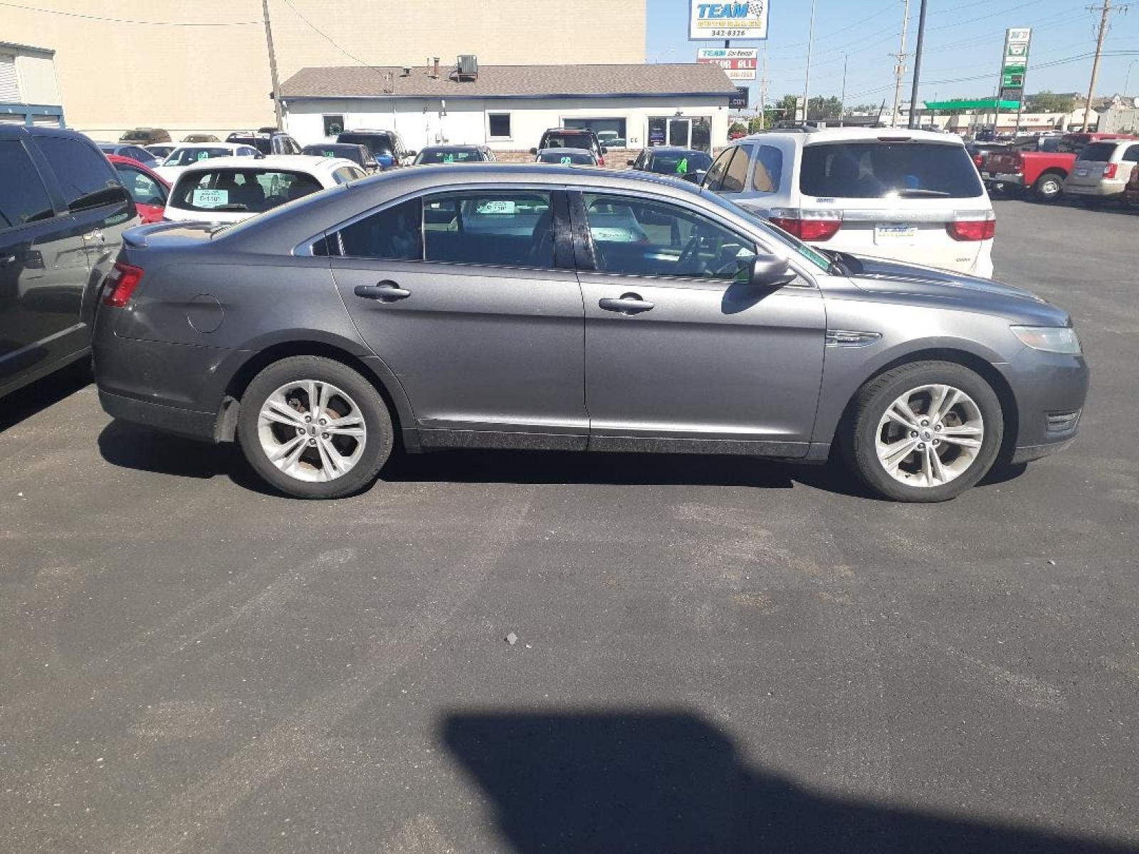 2014 Ford Taurus SEL FWD (1FAHP2E89EG) with an 3.5L V6 DOHC 24V engine, 6-Speed Automatic transmission, located at 2015 Cambell Street, Rapid City, SD, 57701, (605) 342-8326, 44.066433, -103.191772 - CARFAX AVAILABLE - Photo #2