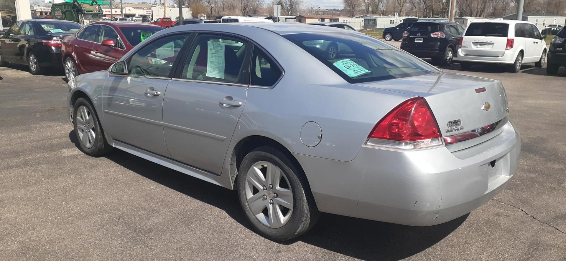 2010 Chevrolet Impala LS (2G1WA5EK4A1) with an 3.5L V6 OHV 16V FFV engine, 4-Speed Automatic Overdrive transmission, located at 2015 Cambell Street, Rapid City, SD, 57701, (605) 342-8326, 44.066433, -103.191772 - CARFAX AVAILABLE - Photo#2