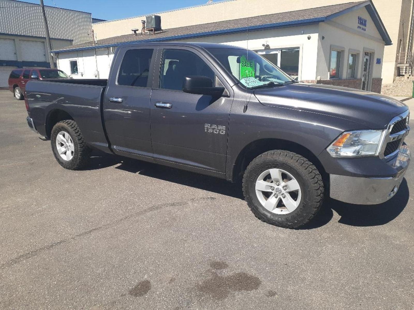 2016 RAM 1500 SLT Quad Cab 4WD (1C6RR7GG0GS) with an 3.6L V6 DOHC 24V FFV engine, 6A transmission, located at 2015 Cambell Street, Rapid City, SD, 57701, (605) 342-8326, 44.066433, -103.191772 - CARFAX AVAILABLE - Photo #4