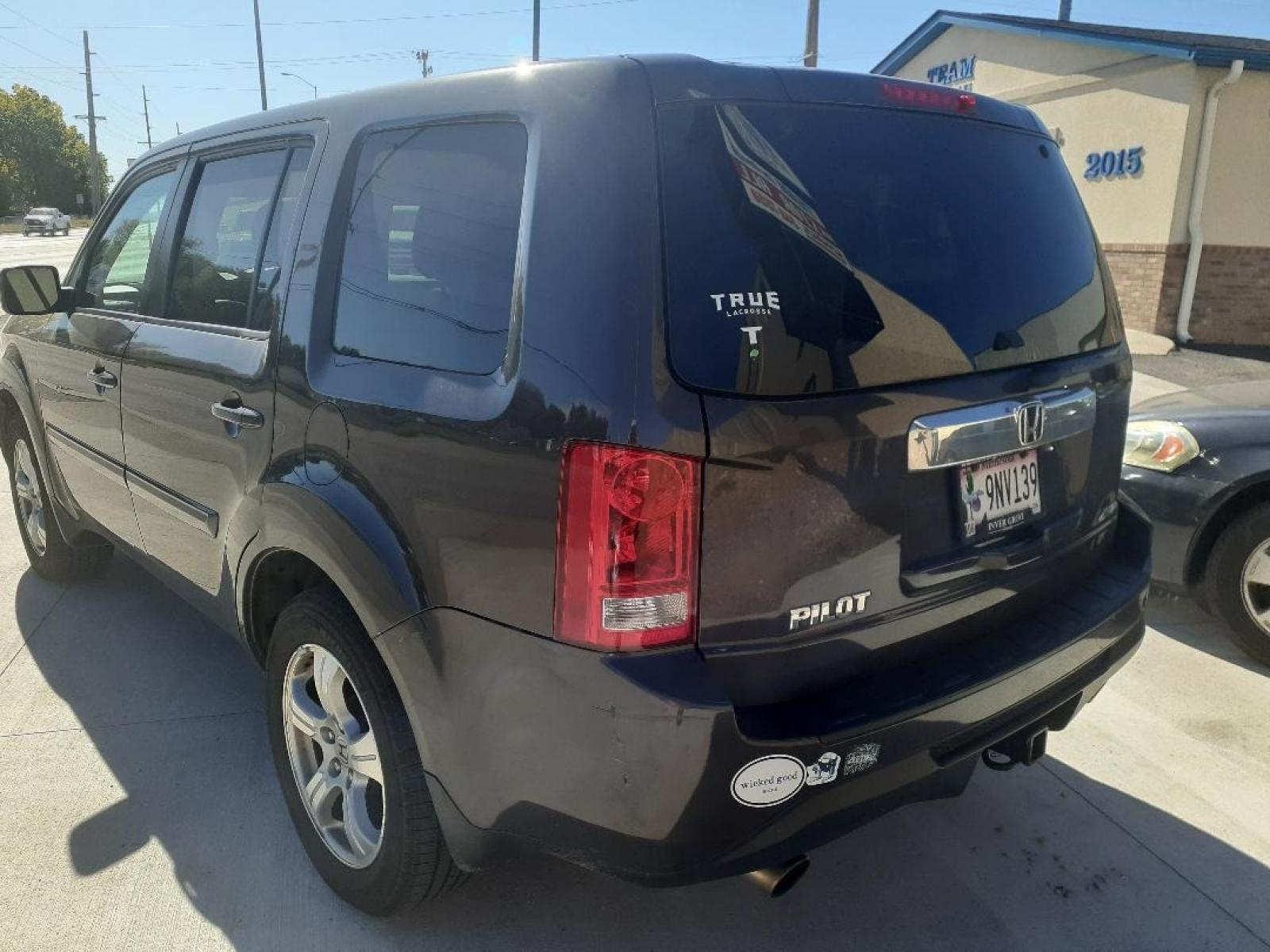 2014 Honda Pilot EX-L 4WD 5-Spd AT (5FNYF4H58EB) with an 3.5L V6 SOHC 24V engine, 5-Speed Automatic transmission, located at 2015 Cambell Street, Rapid City, SD, 57701, (605) 342-8326, 44.066433, -103.191772 - Photo #1