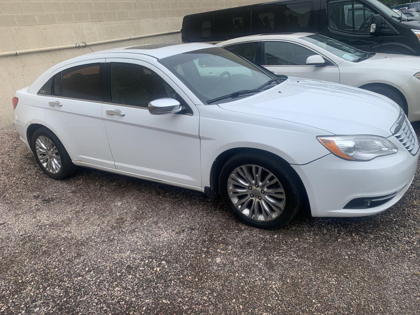 2011 Chrysler 200 (1C3BC2FG5BN) with an 3.6L V6 DOHC 24V engine, Automatic transmission, located at 2015 Cambell Street, Rapid City, SD, 57701, (605) 342-8326, 44.066433, -103.191772 - FRESH TRADE CARFAX AVAILABLE- Photo#1