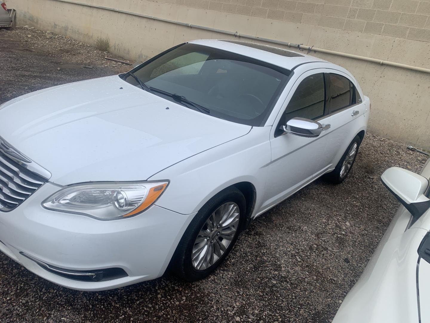 2011 Chrysler 200 (1C3BC2FG5BN) with an 3.6L V6 DOHC 24V engine, Automatic transmission, located at 2015 Cambell Street, Rapid City, SD, 57701, (605) 342-8326, 44.066433, -103.191772 - FRESH TRADE CARFAX AVAILABLE- Photo#2