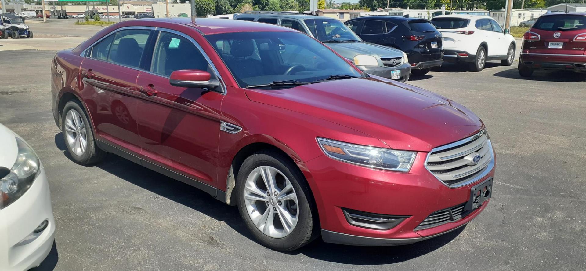 2015 Ford Taurus SEL FWD (1FAHP2E80FG) with an 3.5L V6 DOHC 24V engine, 6-Speed Automatic transmission, located at 2015 Cambell Street, Rapid City, SD, 57701, (605) 342-8326, 44.066433, -103.191772 - CARFAX AVAILABLE - Photo#5