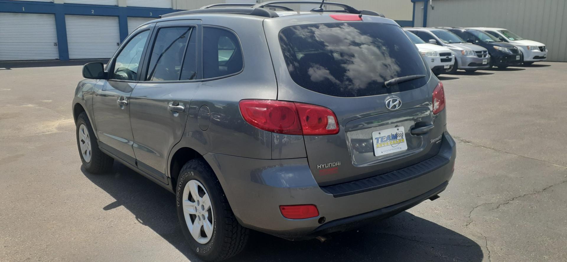 2009 Hyundai Santa Fe GLS AWD (5NMSG73D39H) with an 2.7L V6 DOHC 24V engine, located at 2015 Cambell Street, Rapid City, SD, 57701, (605) 342-8326, 44.066433, -103.191772 - Photo#2