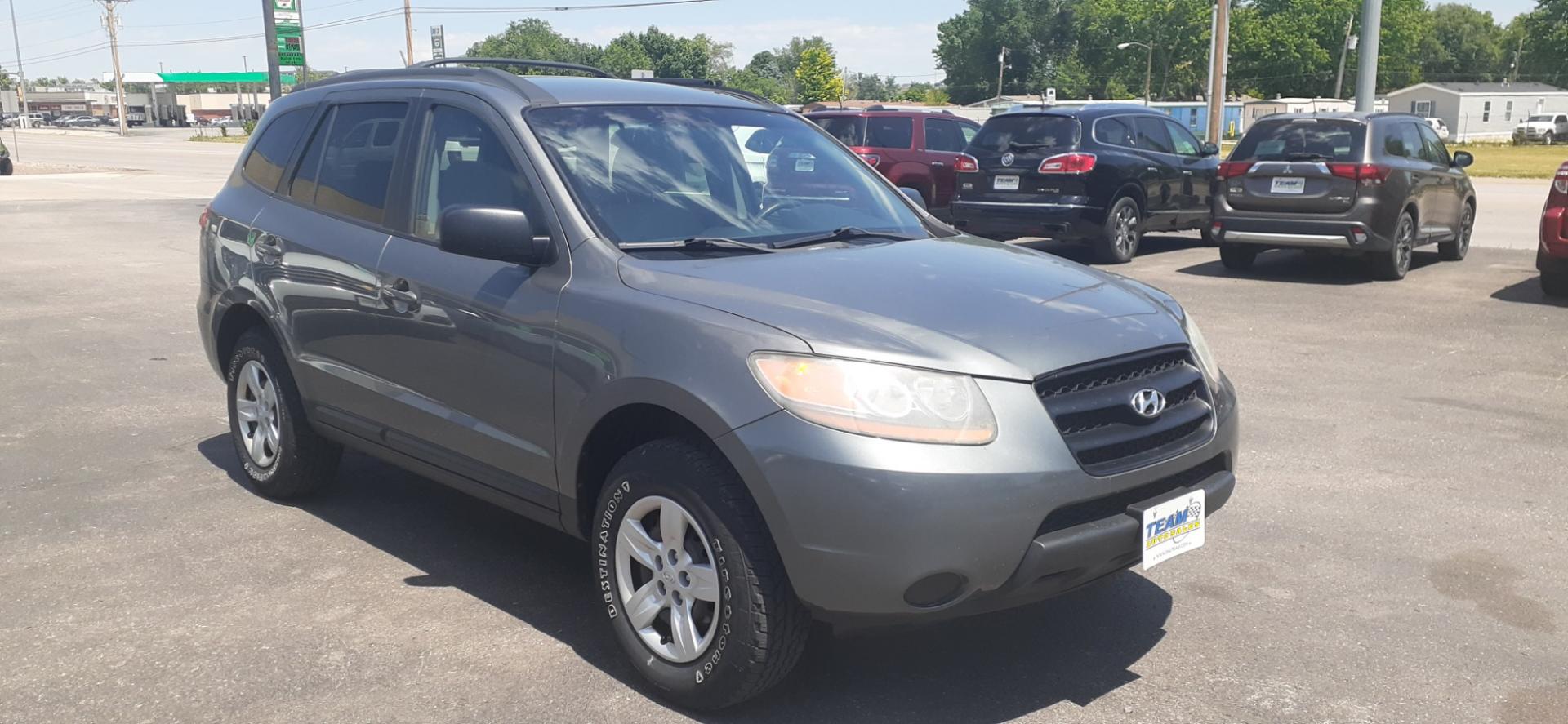 2009 Hyundai Santa Fe GLS AWD (5NMSG73D39H) with an 2.7L V6 DOHC 24V engine, located at 2015 Cambell Street, Rapid City, SD, 57701, (605) 342-8326, 44.066433, -103.191772 - Photo#4