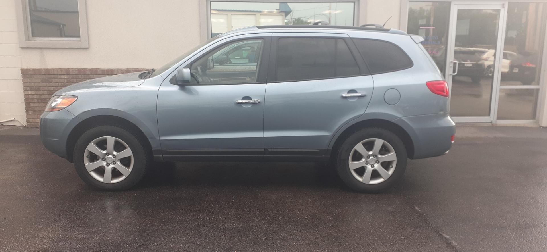 2009 Hyundai Santa Fe Limited AWD (5NMSH73E39H) with an 3.3L V6 DOHC 24V engine, 5-Speed Automatic transmission, located at 2015 Cambell Street, Rapid City, SD, 57701, (605) 342-8326, 44.066433, -103.191772 - CARFAX AVAILABLE - Photo#0