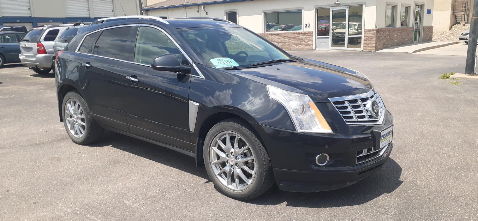 2013 Cadillac SRX (3GYFNJE38DS) , located at 2015 Cambell Street, Rapid City, SD, 57701, (605) 342-8326, 44.066433, -103.191772 - Photo#4