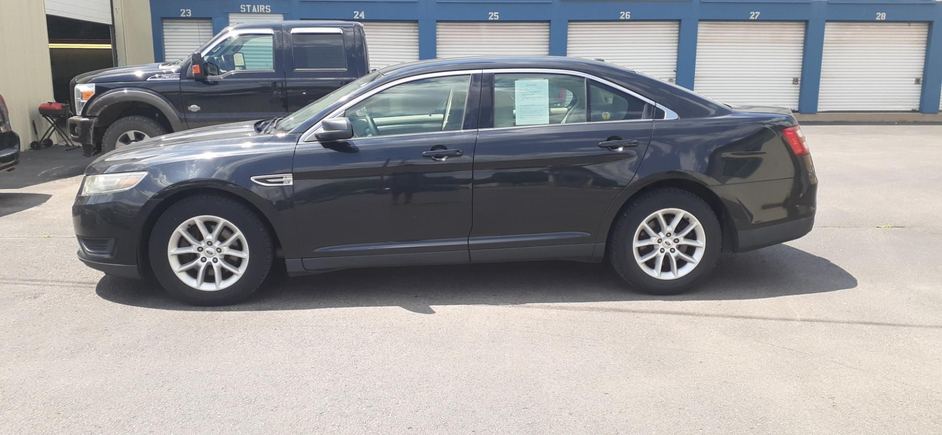 2015 Ford Taurus (1FAHP2D81FG) , located at 2015 Cambell Street, Rapid City, SD, 57701, (605) 342-8326, 44.066433, -103.191772 - CARFAX AVAILABLE - Photo#0