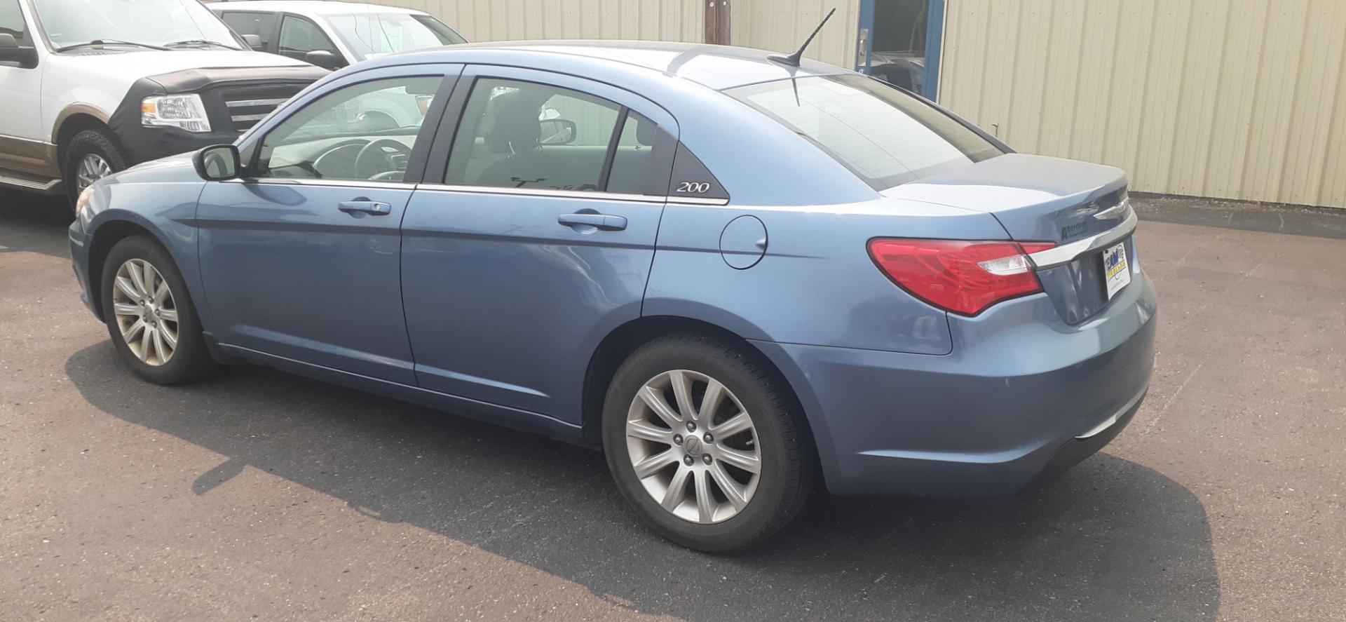 2011 Chrysler 200 Touring (1C3BC1FB8BN) with an 2.4L L4 DOHC 16V engine, 6-Speed Automatic transmission, located at 2015 Cambell Street, Rapid City, SD, 57701, (605) 342-8326, 44.066433, -103.191772 - CARFAX AVAILABLE - Photo#2