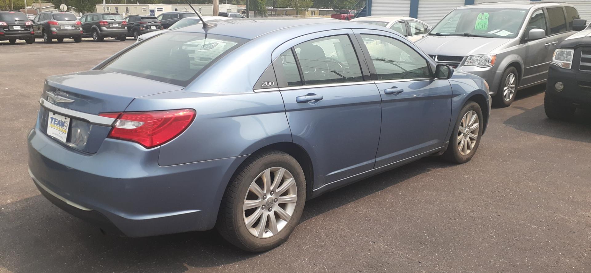 2011 Chrysler 200 Touring (1C3BC1FB8BN) with an 2.4L L4 DOHC 16V engine, 6-Speed Automatic transmission, located at 2015 Cambell Street, Rapid City, SD, 57701, (605) 342-8326, 44.066433, -103.191772 - CARFAX AVAILABLE - Photo#3