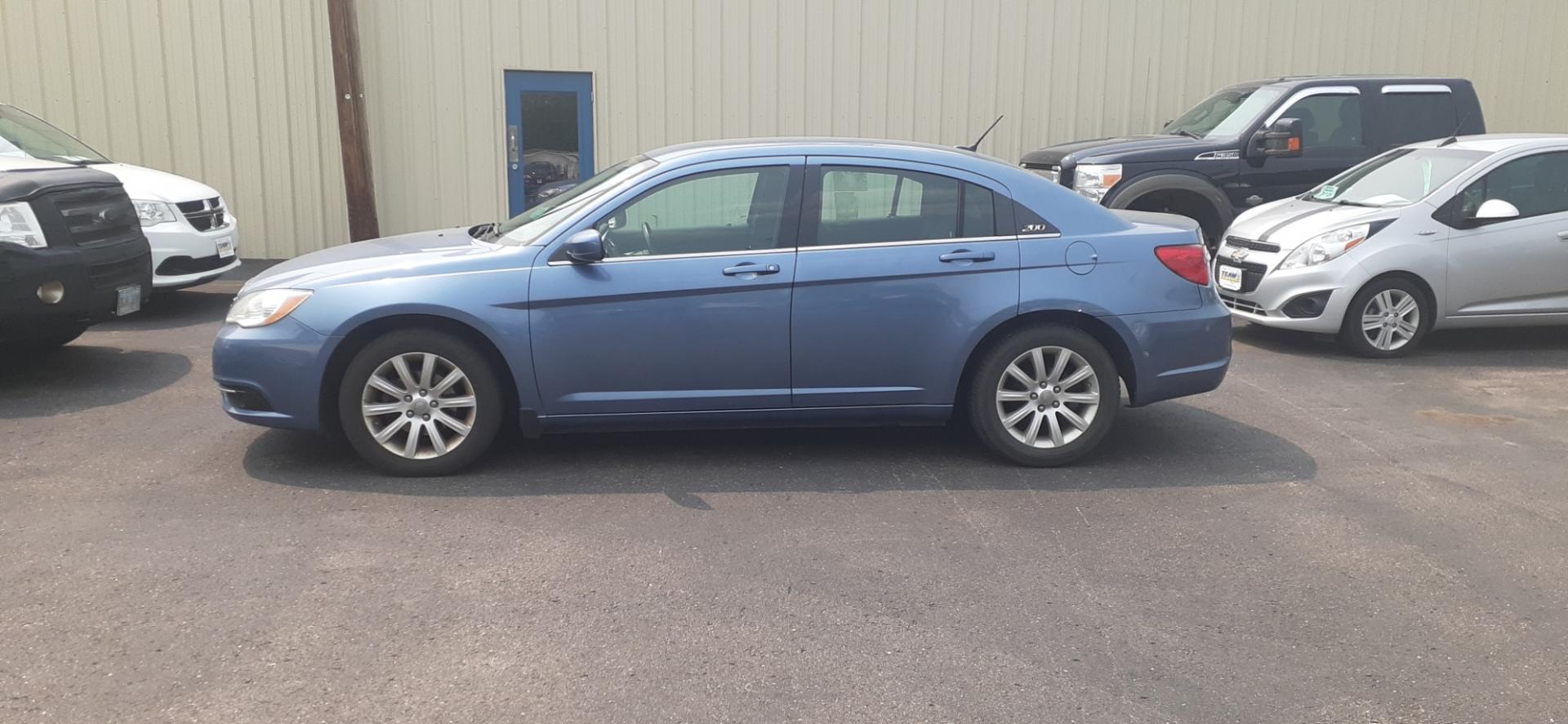 2011 Chrysler 200 Touring (1C3BC1FB8BN) with an 2.4L L4 DOHC 16V engine, 6-Speed Automatic transmission, located at 2015 Cambell Street, Rapid City, SD, 57701, (605) 342-8326, 44.066433, -103.191772 - CARFAX AVAILABLE - Photo#0