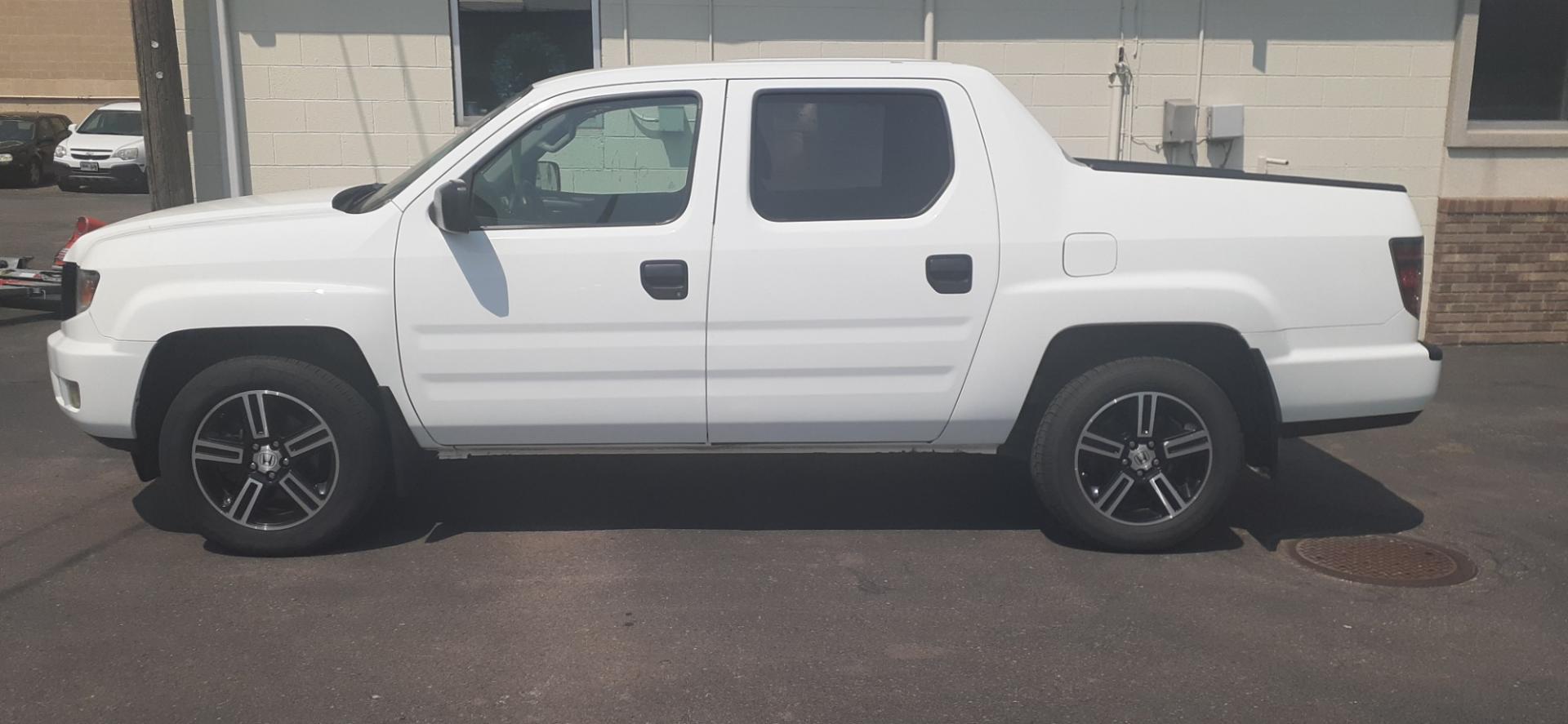 2014 Honda Ridgeline (5FPYK1F78EB) , located at 2015 Cambell Street, Rapid City, SD, 57701, (605) 342-8326, 44.066433, -103.191772 - CARFAX AVAILABLE - Photo#0