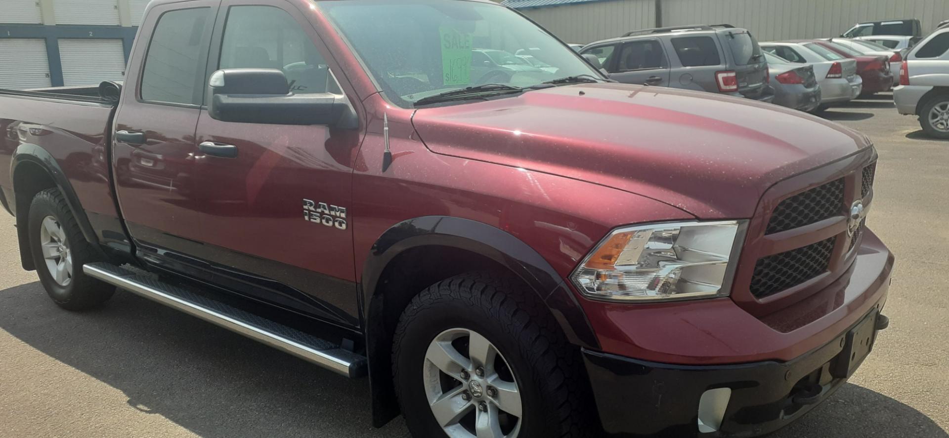 2015 RAM 1500 SLT Quad Cab 4WD (1C6RR7GGXFS) with an 3.6L V6 DOHC 24V FFV engine, 6-Speed Automatic transmission, located at 2015 Cambell Street, Rapid City, SD, 57701, (605) 342-8326, 44.066433, -103.191772 - Photo#4