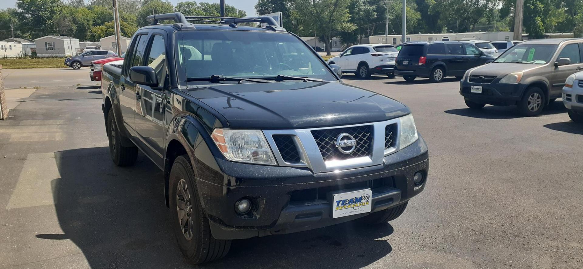 2014 Nissan Frontier SL Crew Cab 4WD (1N6AD0EV8EN) with an 4.0L V6 DOHC 24V engine, 5-Speed Automatic transmission, located at 2015 Cambell Street, Rapid City, SD, 57701, (605) 342-8326, 44.066433, -103.191772 - CARFAX AVAILABLE - Photo#3