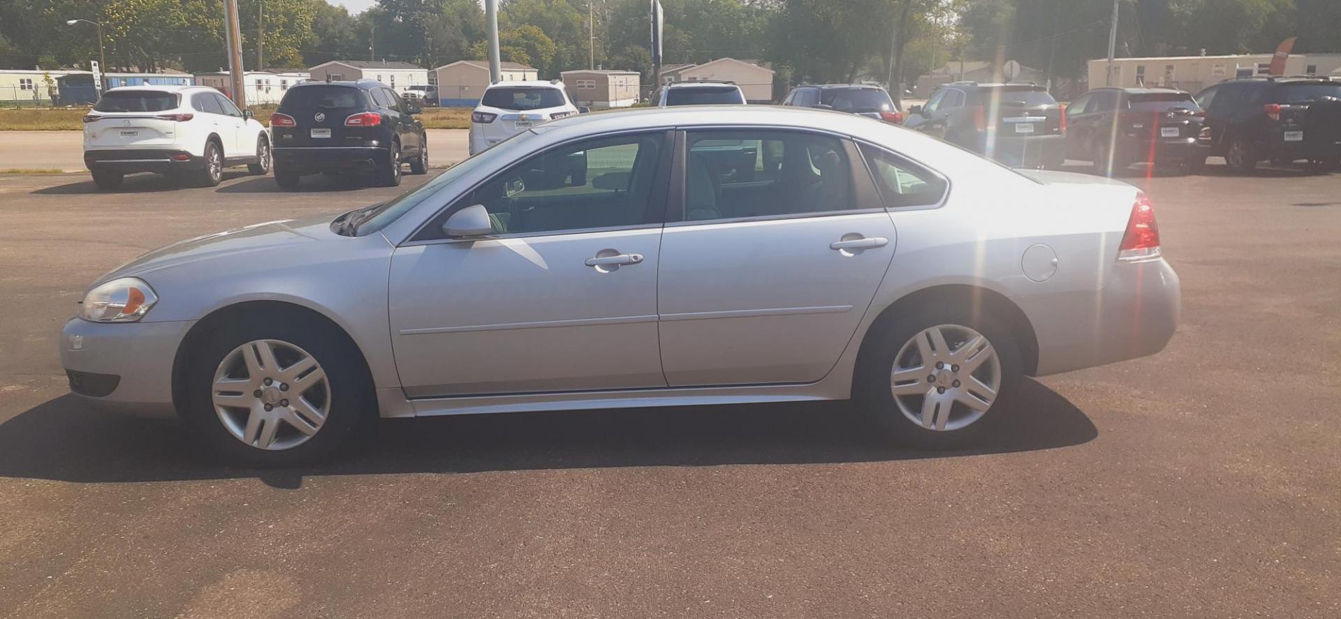 2011 Chevrolet Impala LT (2G1WB5EK4B1) with an 3.5L V6 OHV 12V FFV engine, 4-Speed Automatic transmission, located at 2015 Cambell Street, Rapid City, SD, 57701, (605) 342-8326, 44.066433, -103.191772 - CARFAX AVAILABLE - Photo#0