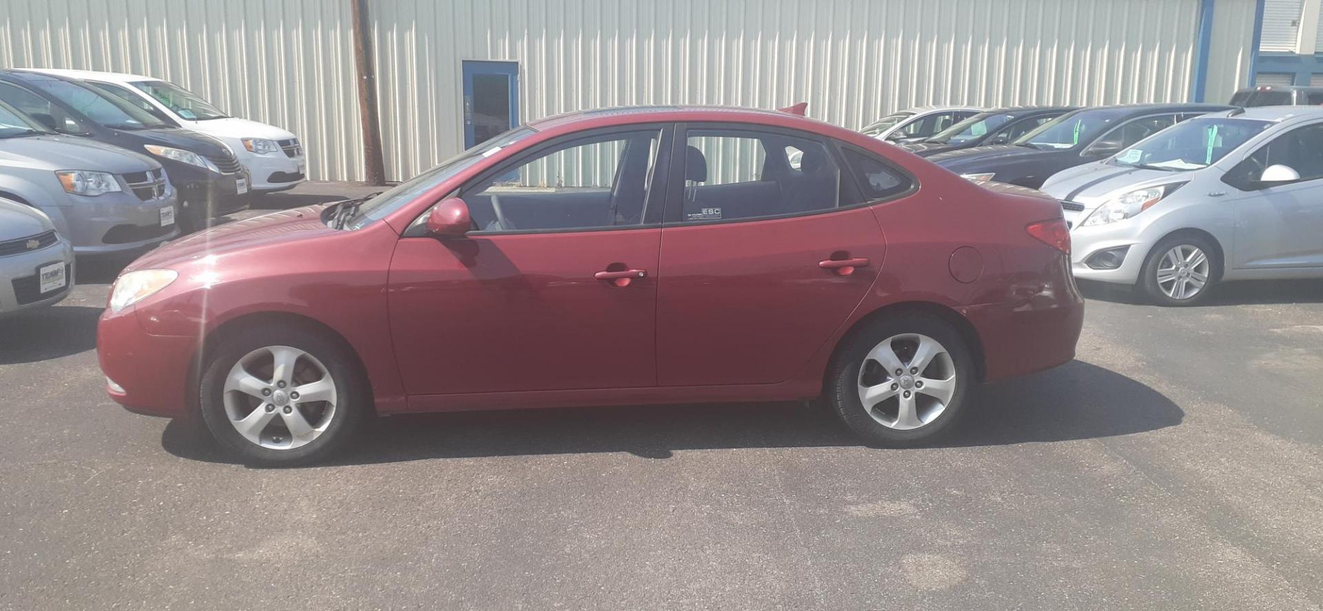 2009 Hyundai Elantra GLS (KMHDU46D99U) with an 2.0L L4 DOHC 16V engine, located at 2015 Cambell Street, Rapid City, SD, 57701, (605) 342-8326, 44.066433, -103.191772 - CARFAX AVAILABLE - Photo#0