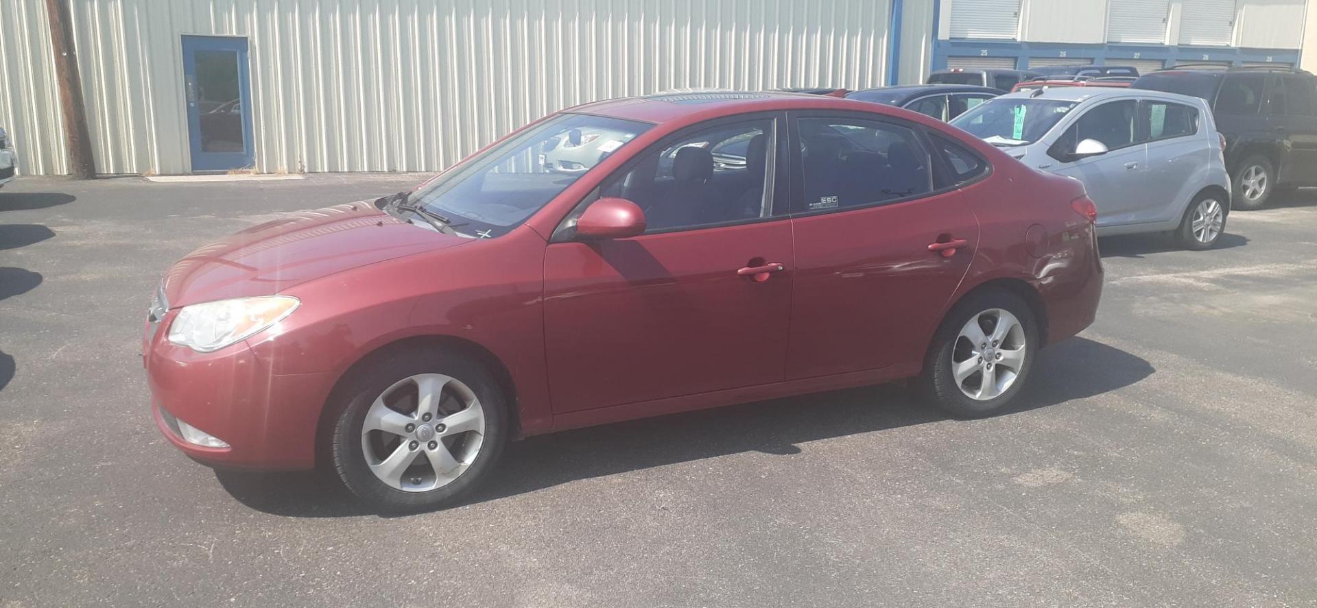 2009 Hyundai Elantra GLS (KMHDU46D99U) with an 2.0L L4 DOHC 16V engine, located at 2015 Cambell Street, Rapid City, SD, 57701, (605) 342-8326, 44.066433, -103.191772 - CARFAX AVAILABLE - Photo#1