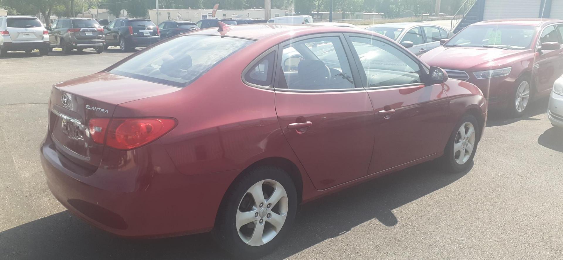 2009 Hyundai Elantra GLS (KMHDU46D99U) with an 2.0L L4 DOHC 16V engine, located at 2015 Cambell Street, Rapid City, SD, 57701, (605) 342-8326, 44.066433, -103.191772 - CARFAX AVAILABLE - Photo#2