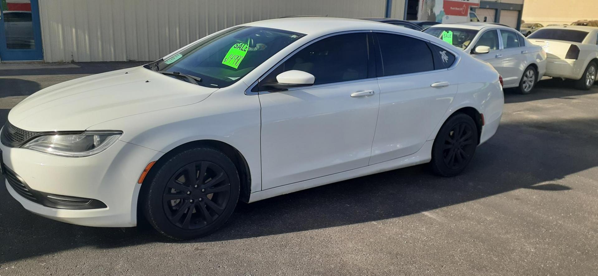 2017 Chrysler 200 LX (1C3CCCFBXHN) with an 2.4L L4 DOHC 16V engine, 9A transmission, located at 2015 Cambell Street, Rapid City, SD, 57701, (605) 342-8326, 44.066433, -103.191772 - CARFAX AVAILABLE - Photo#4