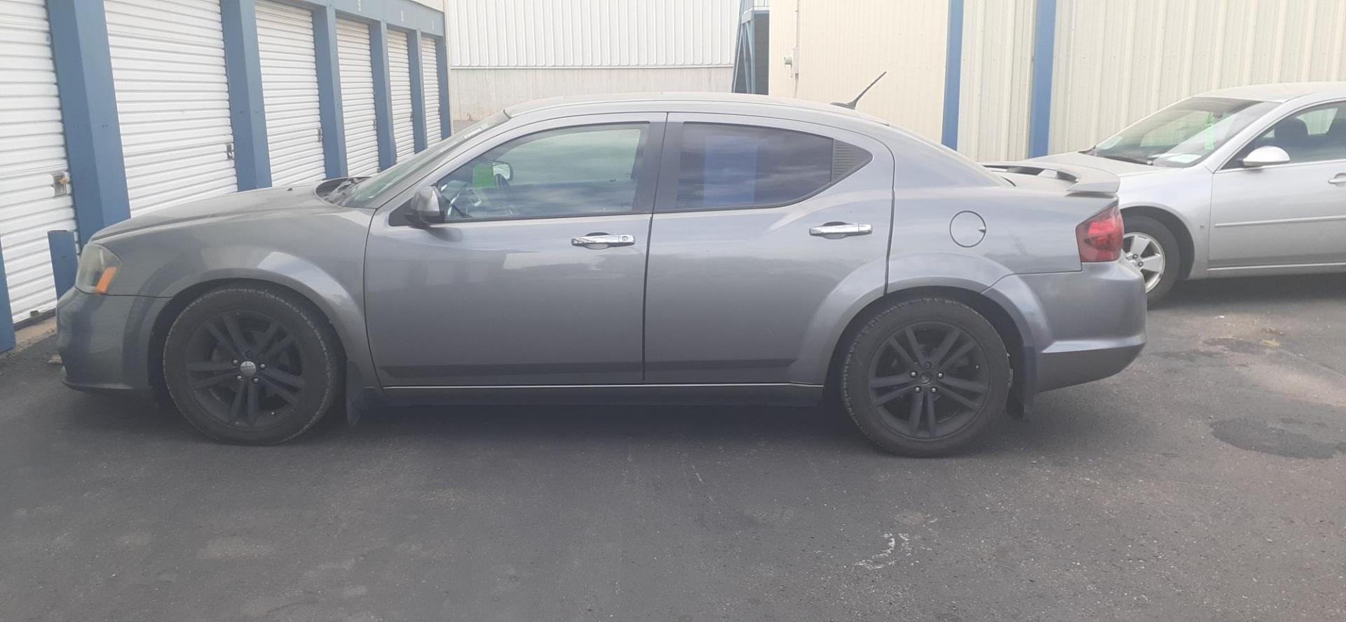 2013 Dodge Avenger SXT (1C3CDZCG5DN) with an 3.6L V6 DOHC 24V FFV engine, 6-Speed Automatic transmission, located at 2015 Cambell Street, Rapid City, SD, 57701, (605) 342-8326, 44.066433, -103.191772 - CARFAX AVAILABLE - Photo#0