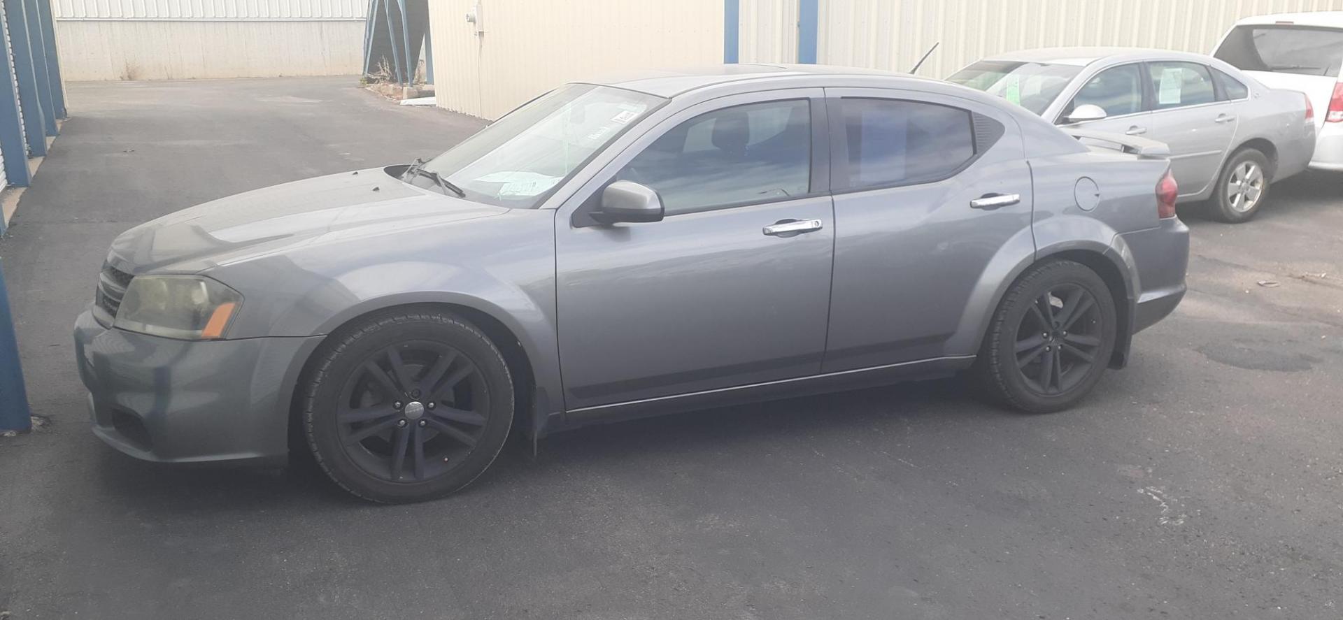 2013 Dodge Avenger SXT (1C3CDZCG5DN) with an 3.6L V6 DOHC 24V FFV engine, 6-Speed Automatic transmission, located at 2015 Cambell Street, Rapid City, SD, 57701, (605) 342-8326, 44.066433, -103.191772 - CARFAX AVAILABLE - Photo#1