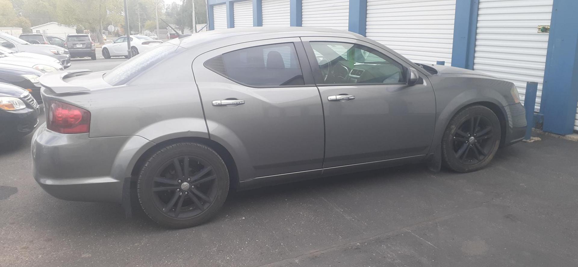 2013 Dodge Avenger SXT (1C3CDZCG5DN) with an 3.6L V6 DOHC 24V FFV engine, 6-Speed Automatic transmission, located at 2015 Cambell Street, Rapid City, SD, 57701, (605) 342-8326, 44.066433, -103.191772 - CARFAX AVAILABLE - Photo#2