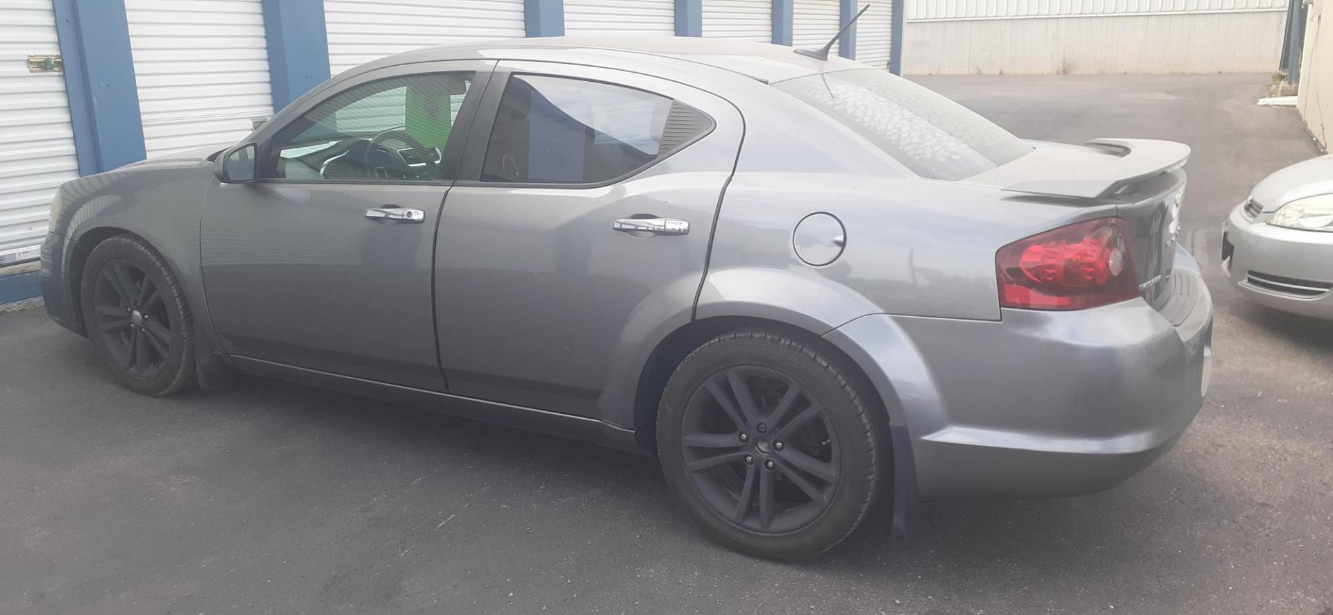 2013 Dodge Avenger SXT (1C3CDZCG5DN) with an 3.6L V6 DOHC 24V FFV engine, 6-Speed Automatic transmission, located at 2015 Cambell Street, Rapid City, SD, 57701, (605) 342-8326, 44.066433, -103.191772 - CARFAX AVAILABLE - Photo#4